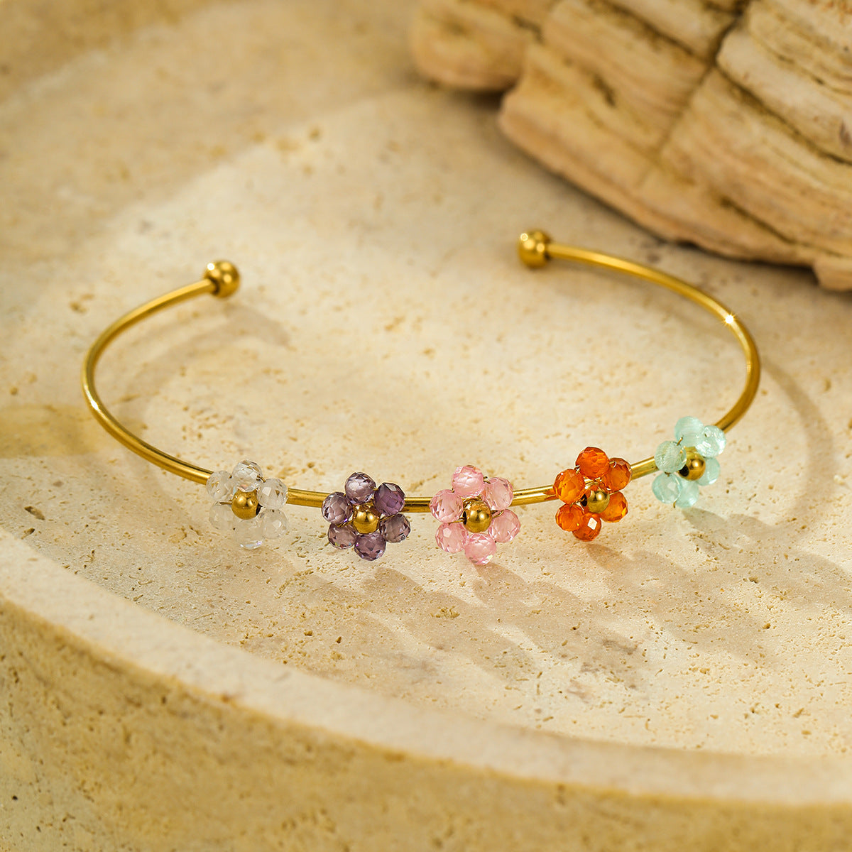 Bracciale a fiore minimalista elegante in acciaio al titanio e zircone con finitura placcata da donna