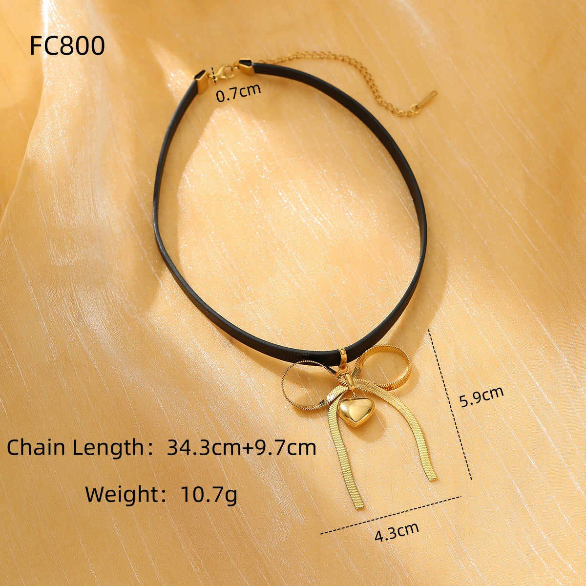 Collana da donna minimalista in acciaio al titanio a forma di fiocco con finitura placcata e accento in pelle
