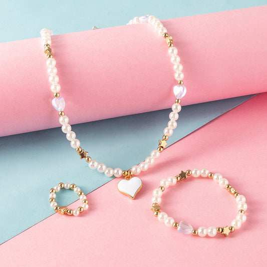 Bonito conjunto de collar con colgante de corazón y estrella con cuentas de vidrio para niñas que incluye collar, anillo y pulsera