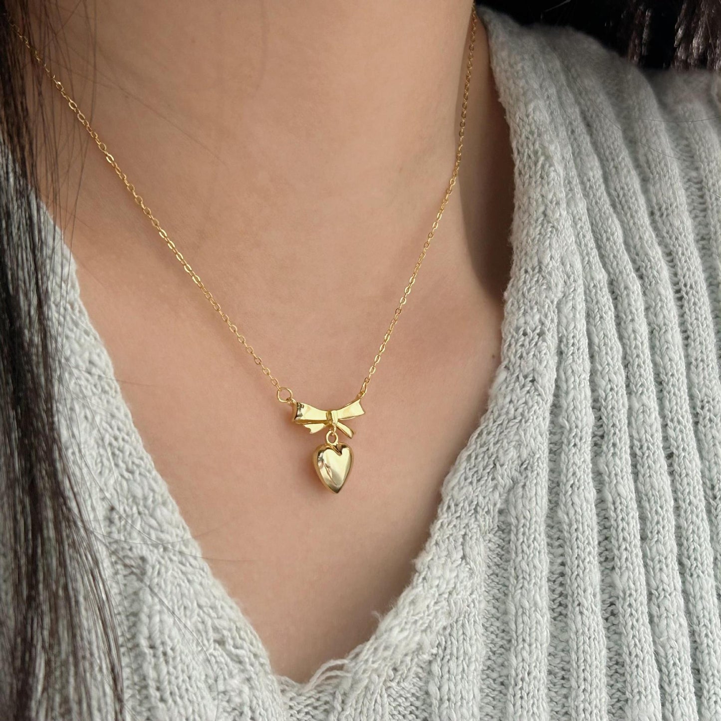 Minimalist Heart and Bow Pendant Necklace in 925 Sterling Silver with Gold Plating on Cross Chain