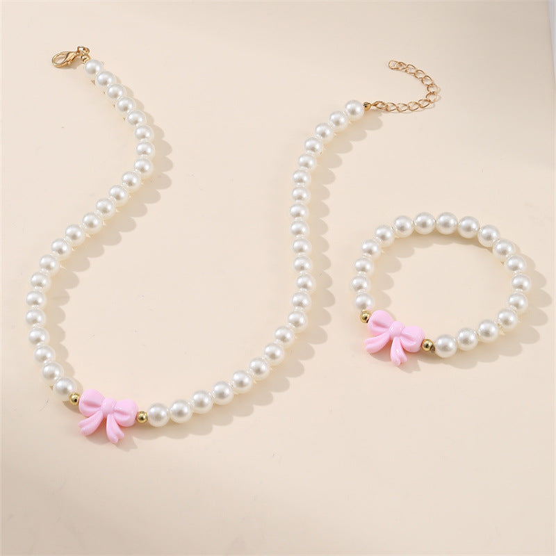 Set collana in lega a forma di fiocco stile principessa per ragazze con catena di perline rotonde e finitura artigianale