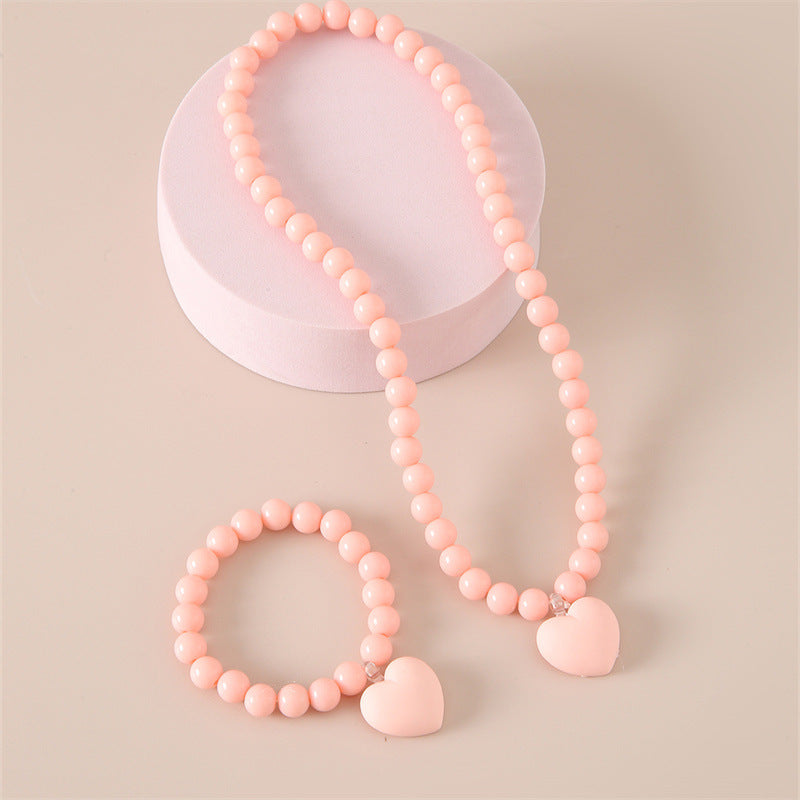 Set collana con ciondolo acrilico a cuore minimalista per bambini con catena di perline di plastica