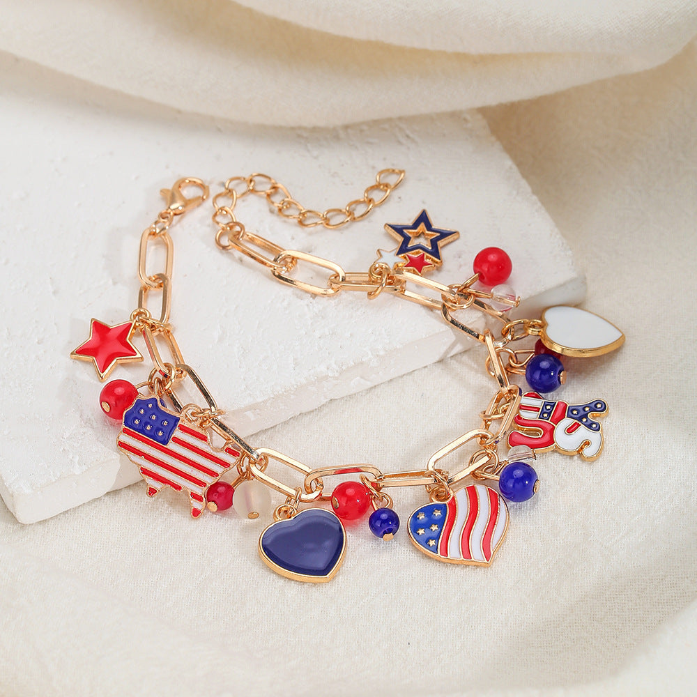 Bracciale in lega con strass a stella geometrica e gocce d'olio