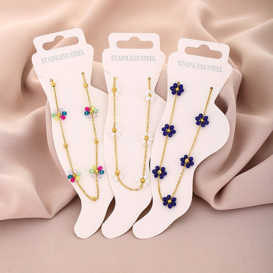 Cavigliera da donna alla moda in acciaio al titanio a forma di petalo con cristalli