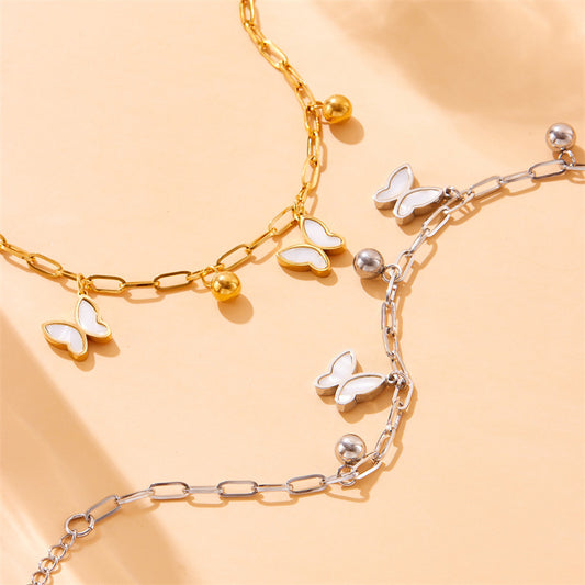Pulsera de lujo de acero inoxidable con colgante de mariposa para mujer