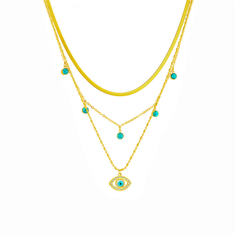 Collana da donna alla moda con ciondolo turchese intagliato a forma di occhio blu in strass, catena a serpente in acciaio inossidabile e finitura placcata