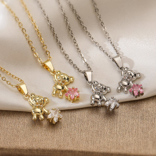Collar con colgante de cobre minimalista con forma de oso con baño de oro real y detalles de circonita para mujer