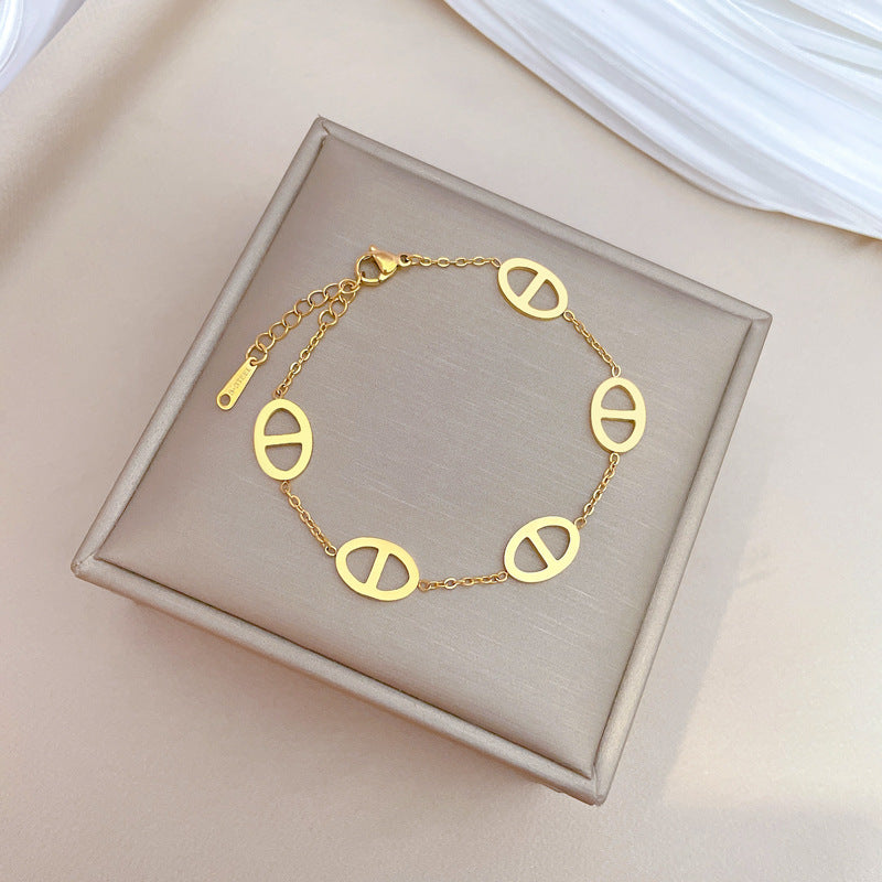 Minimalist Vintage Titanium Steel Zodiac Bracelet for Women and Men with Four-Season Bean and Water Ripple Pattern