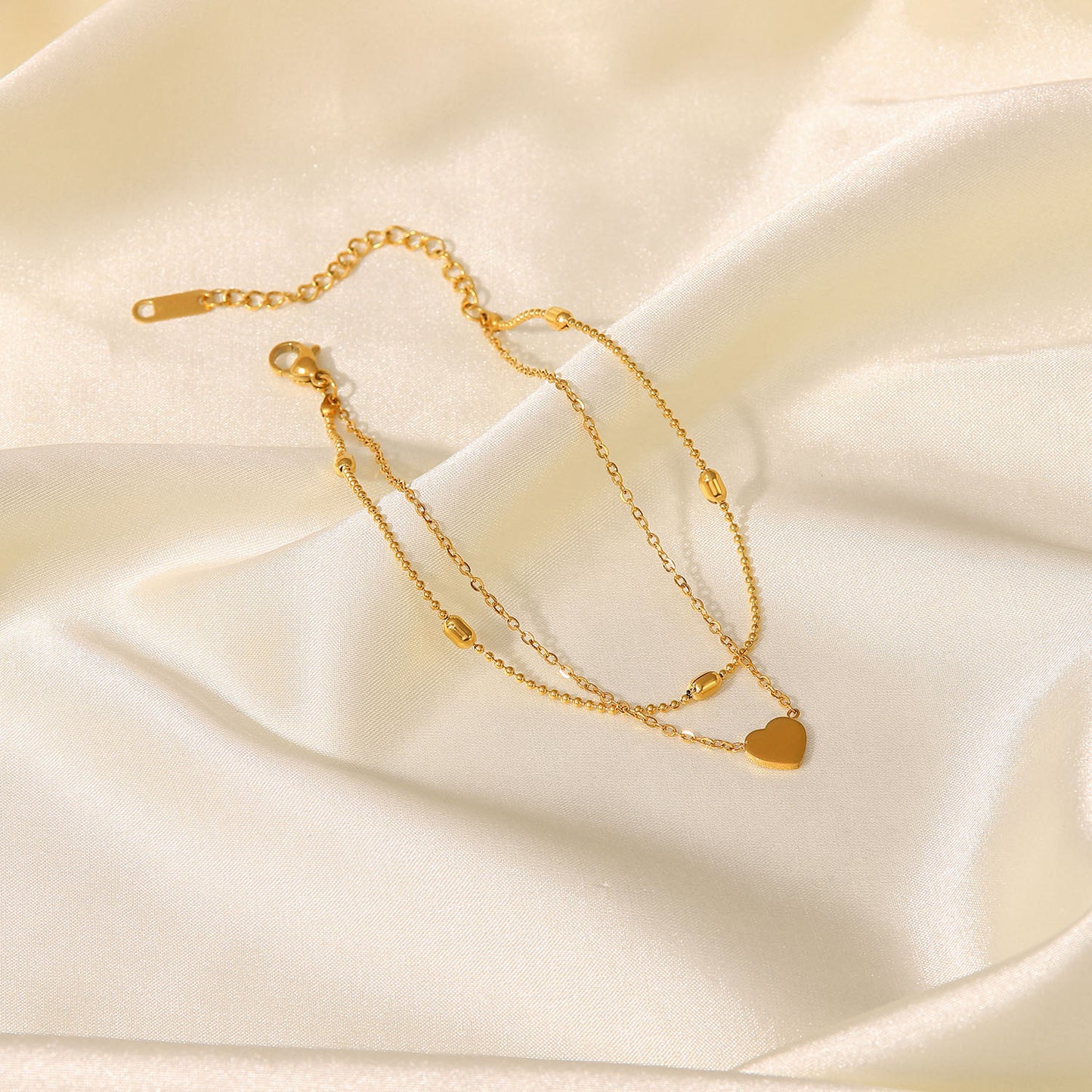 Minimalist Titanium Steel Anklet with 18K Gold Heart Pendant and Oval Beads Dual-Layer Women's Anklet Jewelry