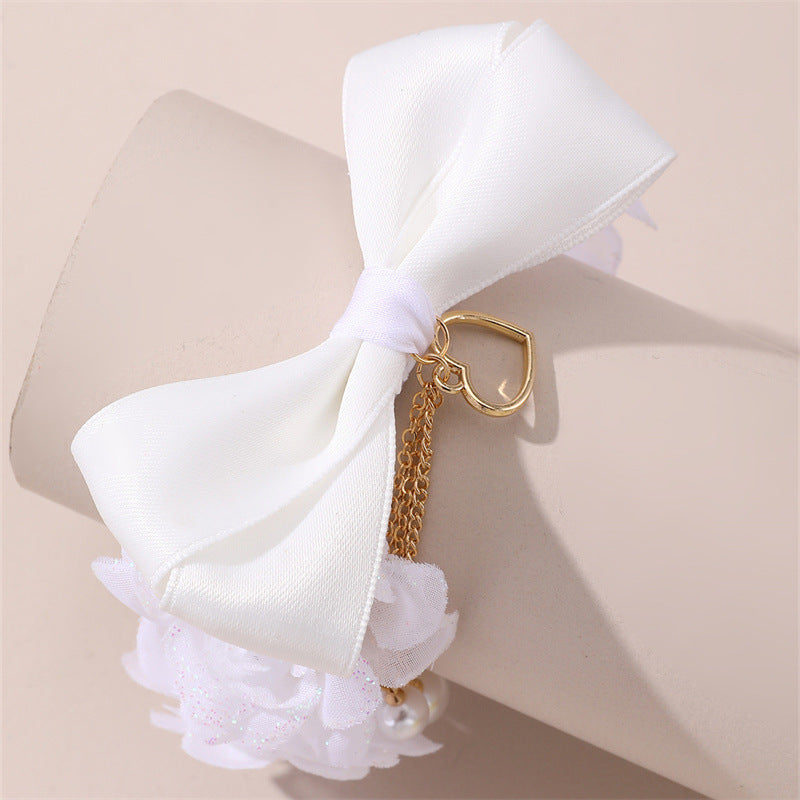 Fermacapelli per Bambini con Fiocco a Forma di Fiore Bianco, Perle, Nappina e Decorazione 3D