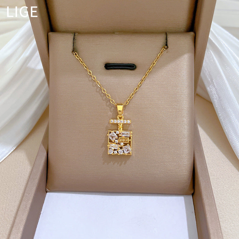 Set di collana e orecchini in acciaio al titanio con design geometrico minimalista, intarsio di strass e finitura placcata per donna