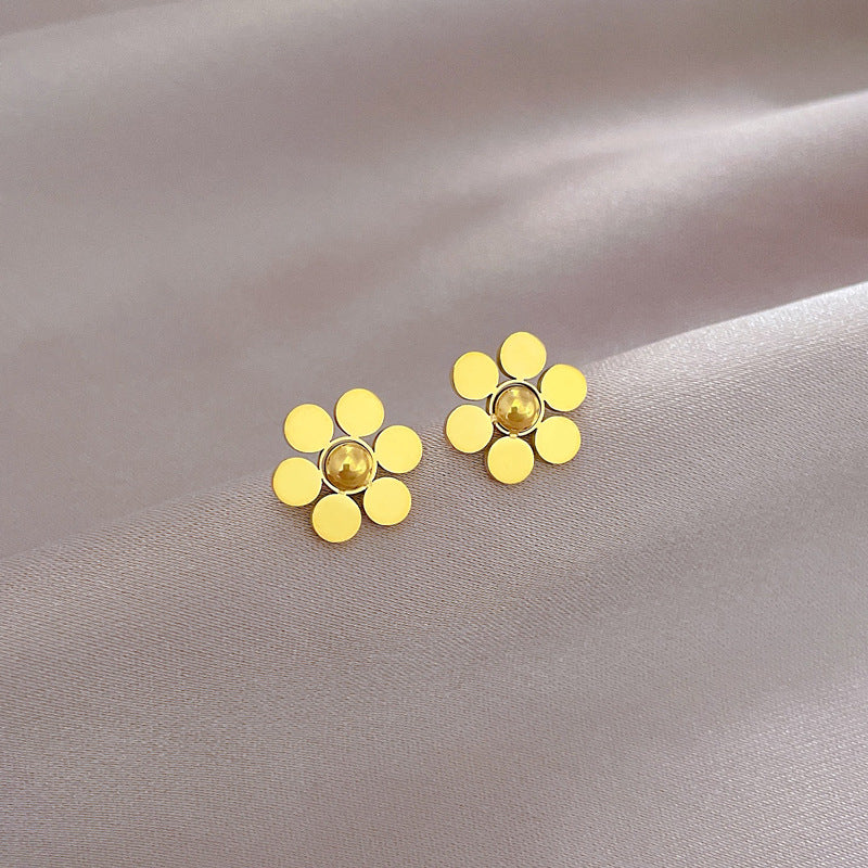 Orecchini a perno geometrici minimalisti in acciaio al titanio con finitura placcata per donna, design a fiore a sei petali ispirato alla natura
