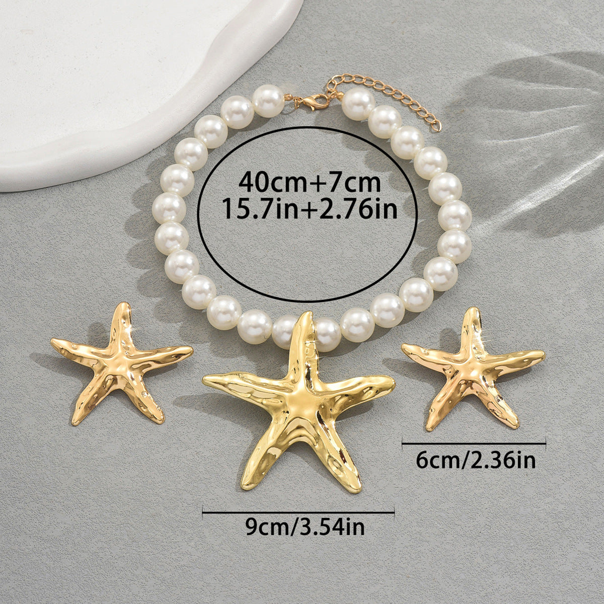Collana e orecchini a forma di stella marina alla moda da donna con ciondolo in lega e perle d'acqua dolce su catena a sfere