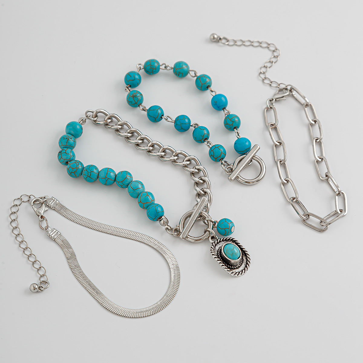 Set di braccialetti vintage bohémien geometrici in lega con catena a serpente, nappe e design asimmetrico
