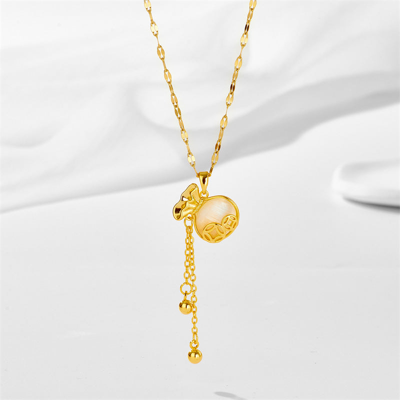 Collana con pendente a moneta con occhio di gatto geometrico e nappe su catena ondulata in acciaio inossidabile con placcatura in oro