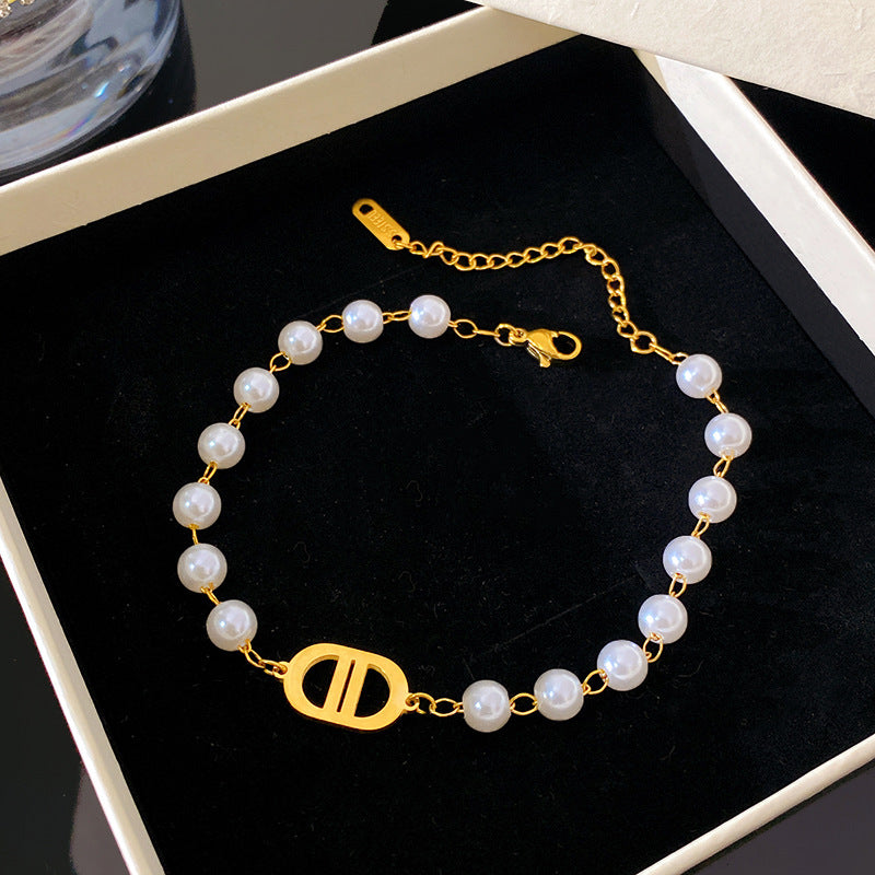 Geometric Letter Pig Nose Double D Clover Titanium Steel Plated Pearl Bracelet