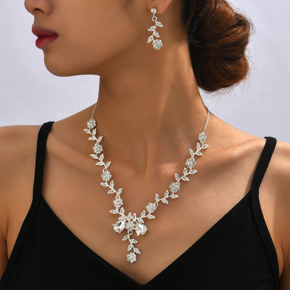 Exaggerated Floral Rhinestone and Crystal Necklace and Earring Set with Cross Chain