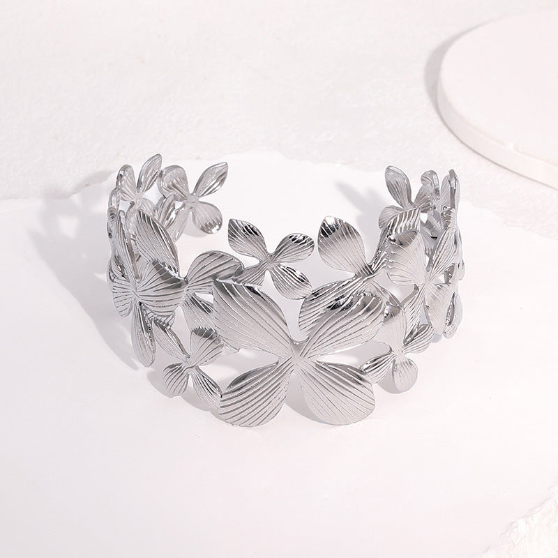 Minimalist 18K Gold Plated Stainless Steel Wide Cuff Bracelet with Lily Flower Design for Women
