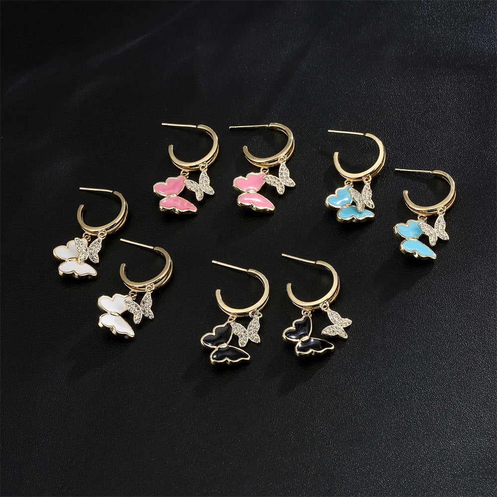 Minimalist Butterfly Earrings in Copper with 18K Gold Plating and Zircon Inlay