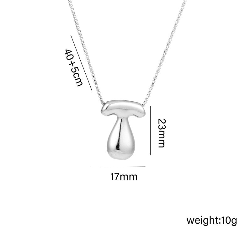 Collar con colgante de acero titanio con forma de letra minimalista y chapado en oro para mujer