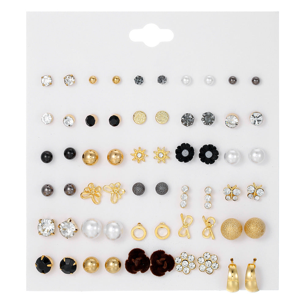 Geometric Asymmetric Micro-inlay Cubic Zirconia and Pearl Titanium Steel Earrings Set with Bow Design