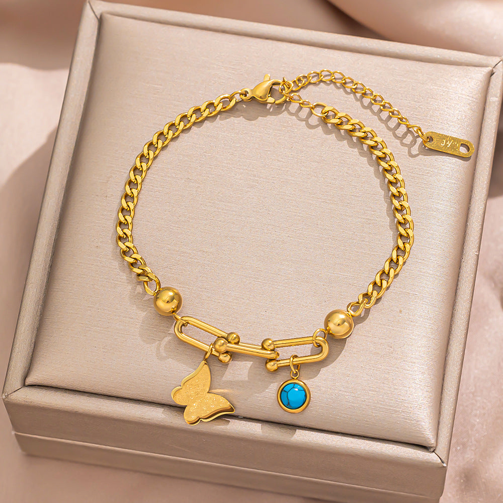 Geometric Stainless Steel Plated 18K Gold Butterfly-Shaped Bracelet with Turquoise Inlay and Horseshoe Clasp