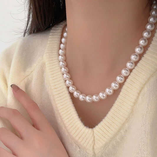 Collar minimalista en forma de estrella de plata de ley 925 con detalles de cristal y perlas