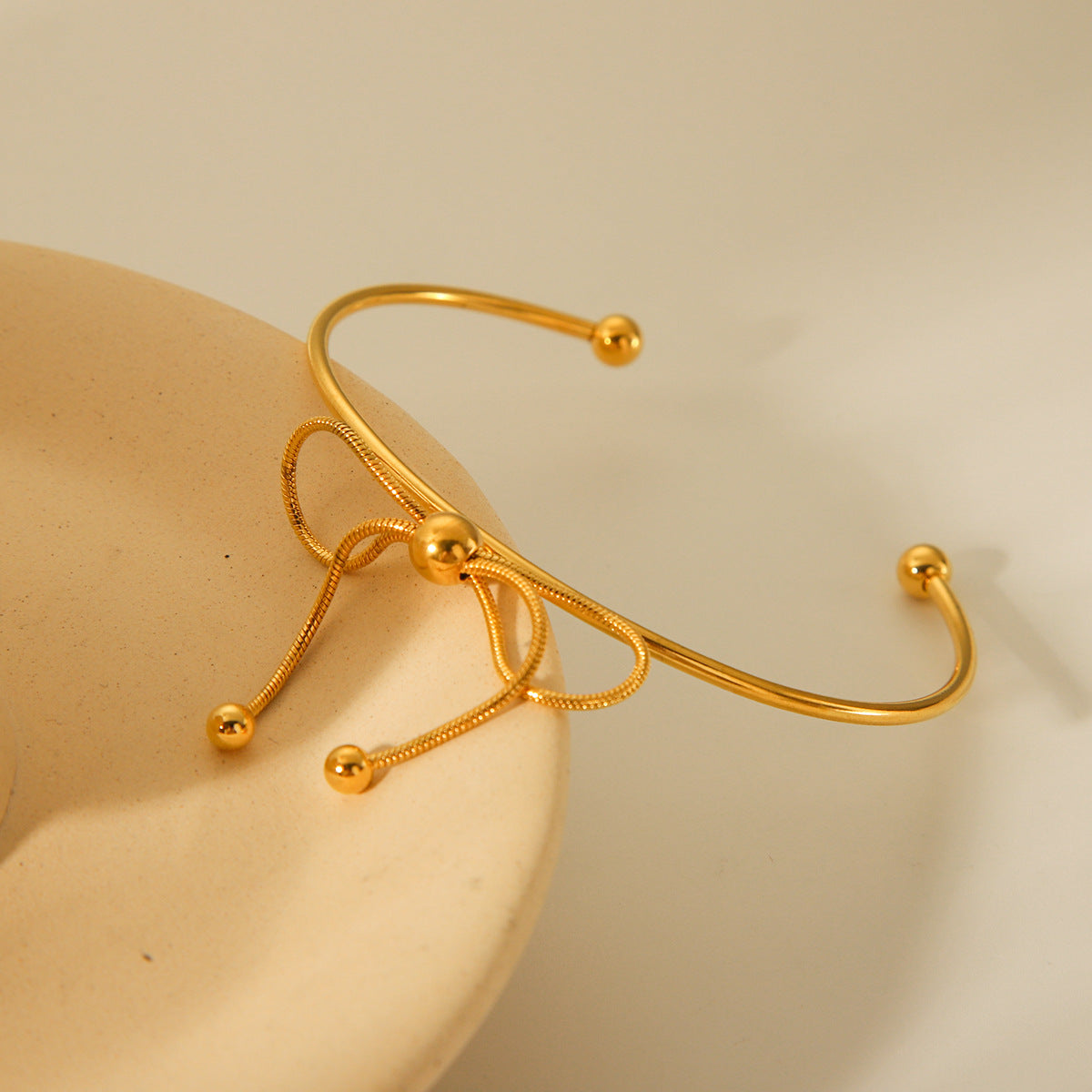 Fashionable 18K Gold Plated Stainless Steel Bow Knot Open Cuff Bracelet for Women