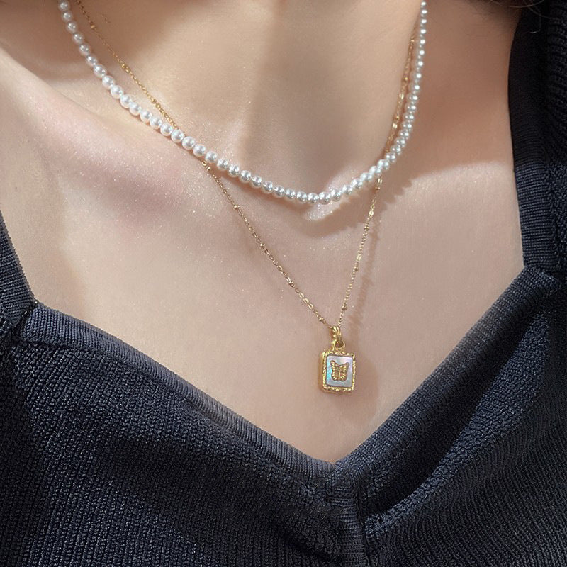 Elegant Butterfly Pendant Necklace for Women in Titanium Steel with Mother-of-Pearl Inlay, Plated Finish, O-Chain, Minimalist and Unique Style