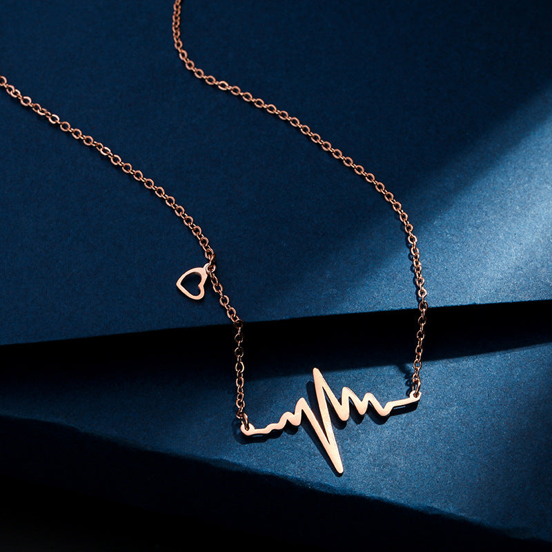 Collana con ciondolo geometrico a battito cardiaco ECG dal design originale da donna in acciaio al titanio con finitura placcata