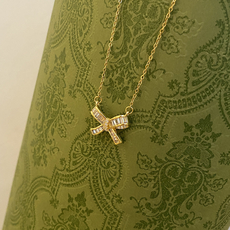 Minimalist Bow-Shaped Titanium Steel Plated Clavicle Necklace with Micro-Pave Zirconia for Women and Men