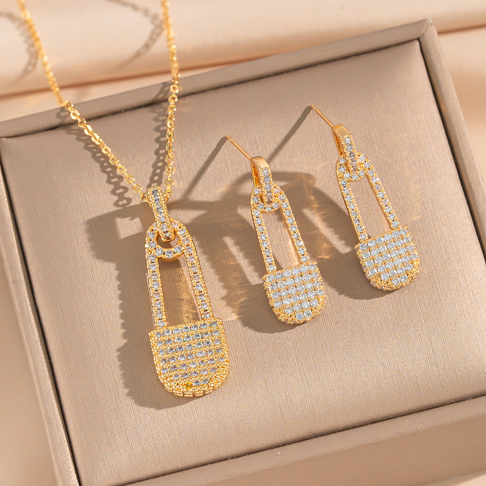 Set di collana e orecchini in acciaio al titanio con zirconi a forma di graffetta minimalista da donna