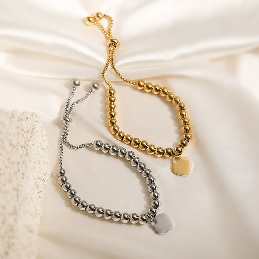 Pulsera de cuentas minimalista de lujo con colgante de corazón ajustable de acero inoxidable para mujer con acabado chapado