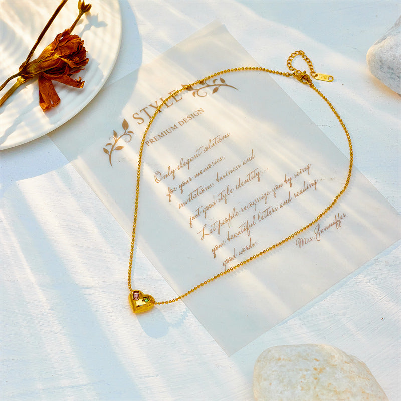 Collana girocollo da donna minimalista con ciondolo irregolare a forma di cuore in acciaio inossidabile con strass intarsiati e catena a serpente lucida