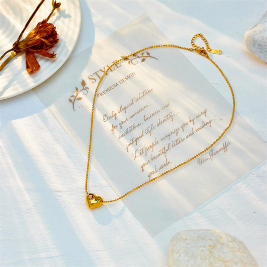 Collana girocollo da donna minimalista con ciondolo irregolare a forma di cuore in acciaio inossidabile con strass intarsiati e catena a serpente lucida