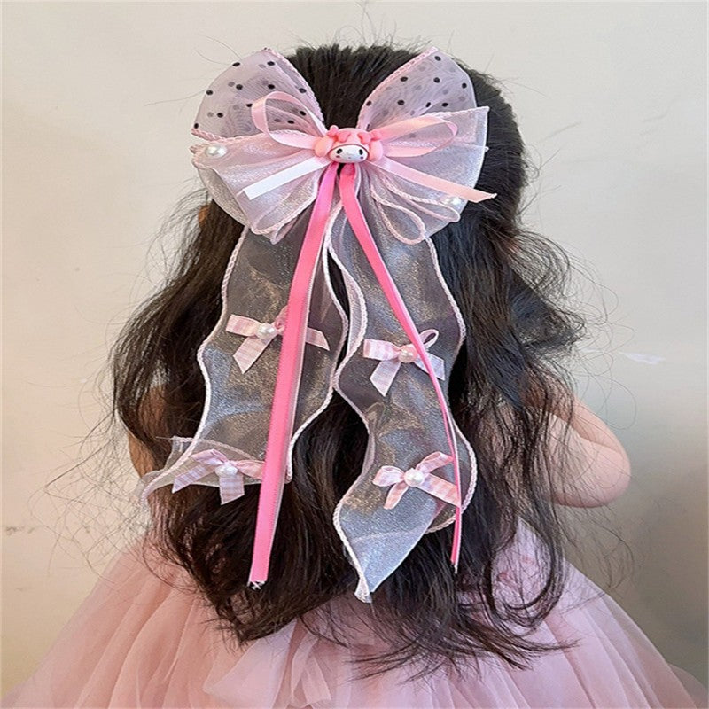 Handmade Chinese Traditional Hair Clip for Girls with Bow Shape Fabric Material and Flowing Tassels in Natural Style