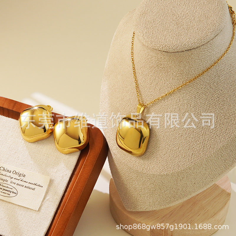 Conjunto de joyas de acero inoxidable con baño de oro minimalista con colgante de corazón floral y lazo en cadena para mujer