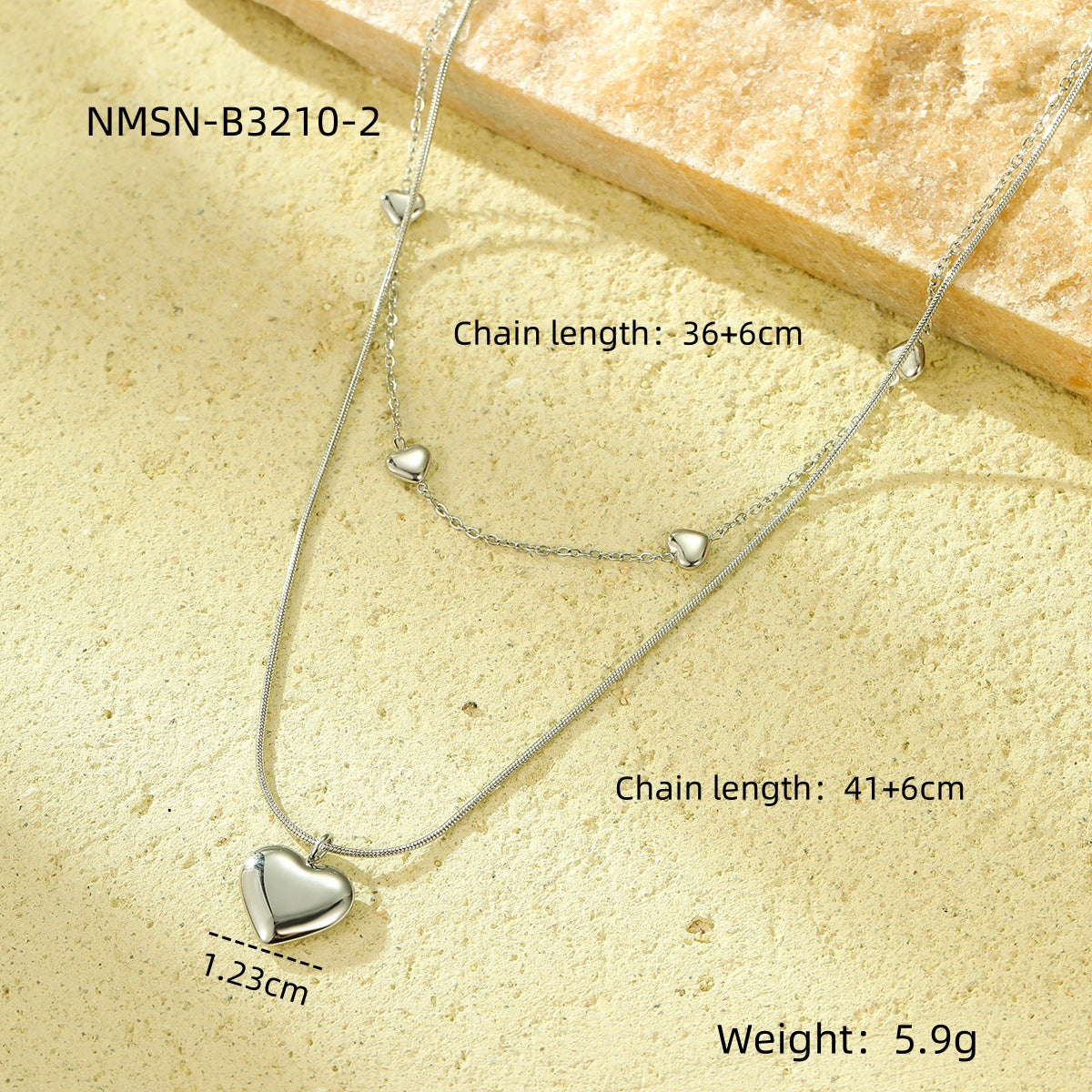Collana alla moda da donna con ciondolo a cuore a doppio strato in acciaio al titanio con finitura placcata