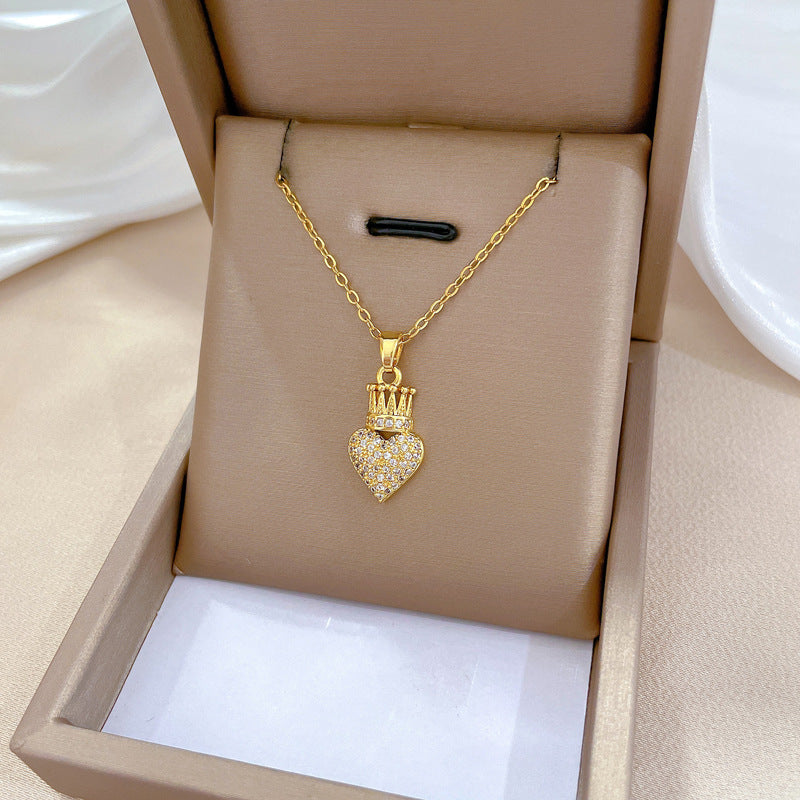 Collana con ciondolo a corona e cuore elegante da donna in acciaio inossidabile, catena a serpente con strass, design geometrico minimalista