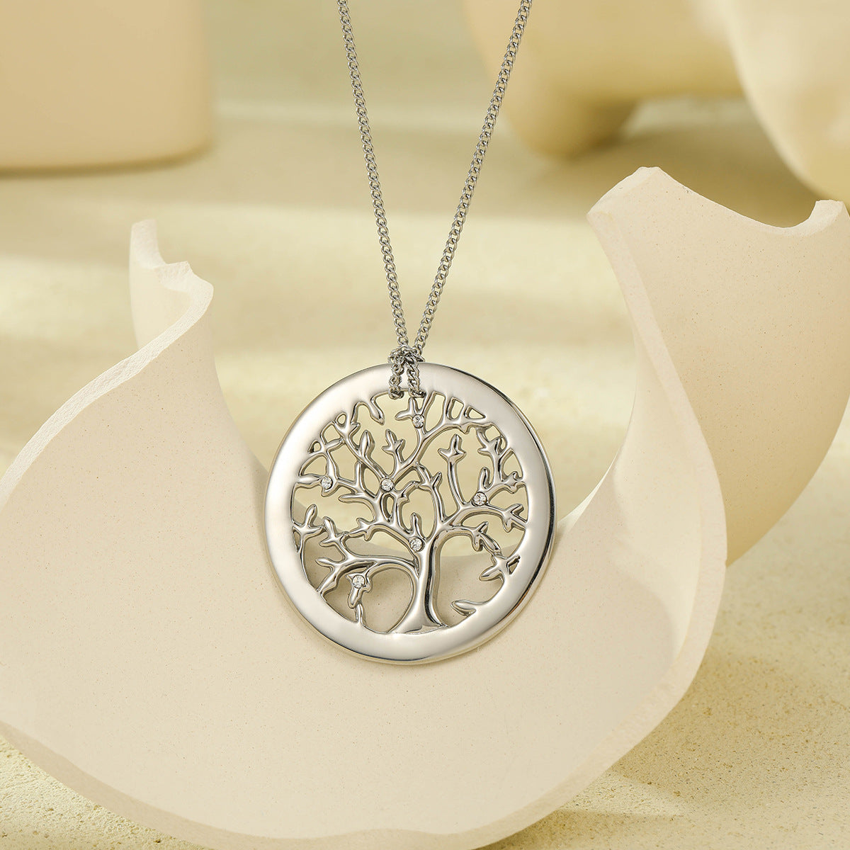 Collana con ciondolo Albero della Vita geometrico minimalista da donna in acciaio al titanio con intarsio in strass e finitura placcata