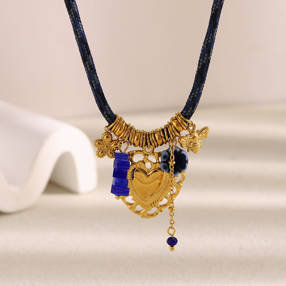 Luxury Vintage Style Hollow Heart Pendant Necklace in Stainless Steel with 18K Gold Plating