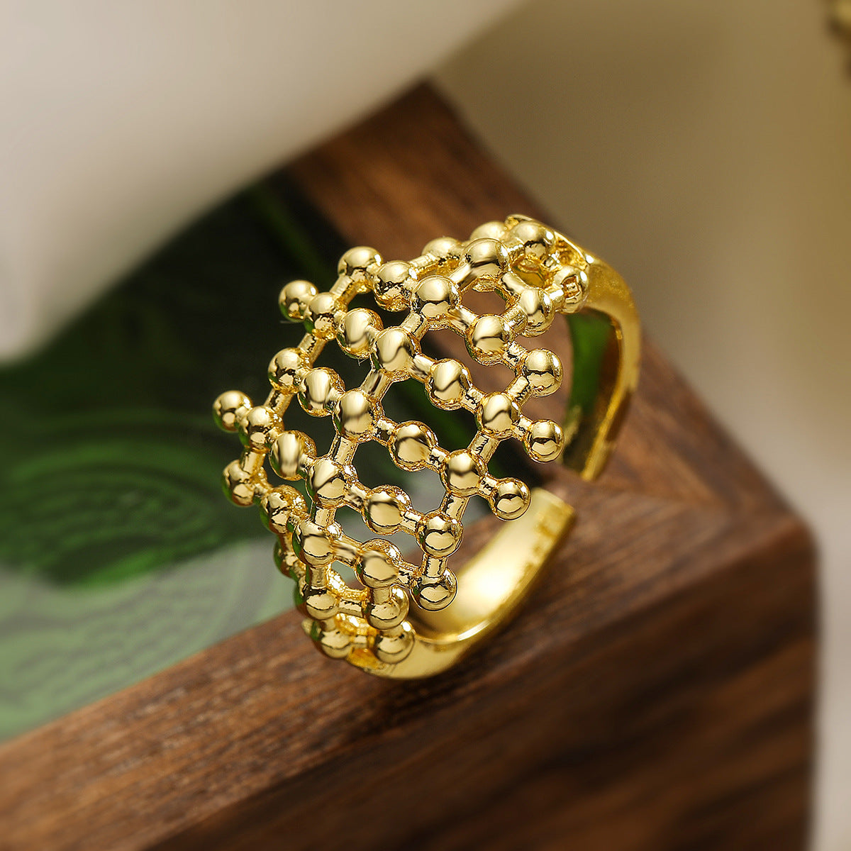 Minimalist Geometric Hollow-Out Copper Ring with 18K Gold Plating and Zircon Accents for Women