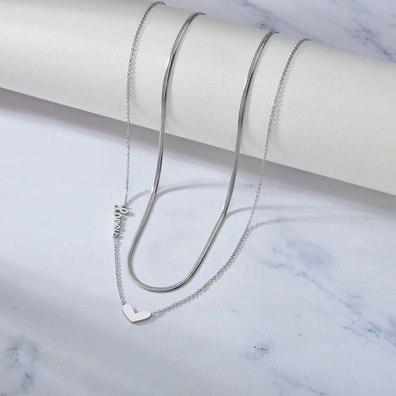 Elegant Heart-Shaped Titanium Steel Pendant Necklace for Women with Polished Finish and Minimalist Design