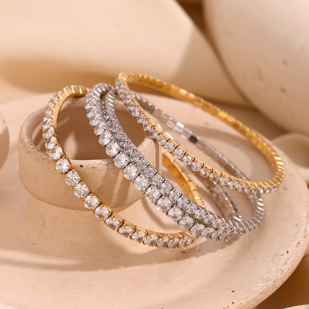 Elegante bracciale elastico da donna con strass, in acciaio inossidabile placcato oro 18 carati con forme geometriche