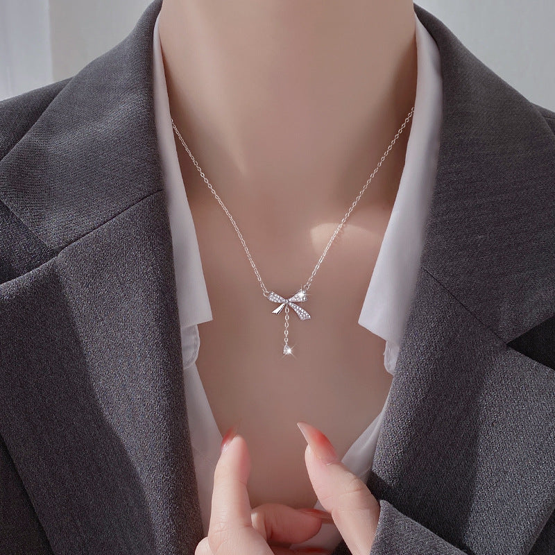 Minimalist Bow-Shaped Titanium Steel Pendant Necklace for Women with Plated Finish and Delicate Layered Look