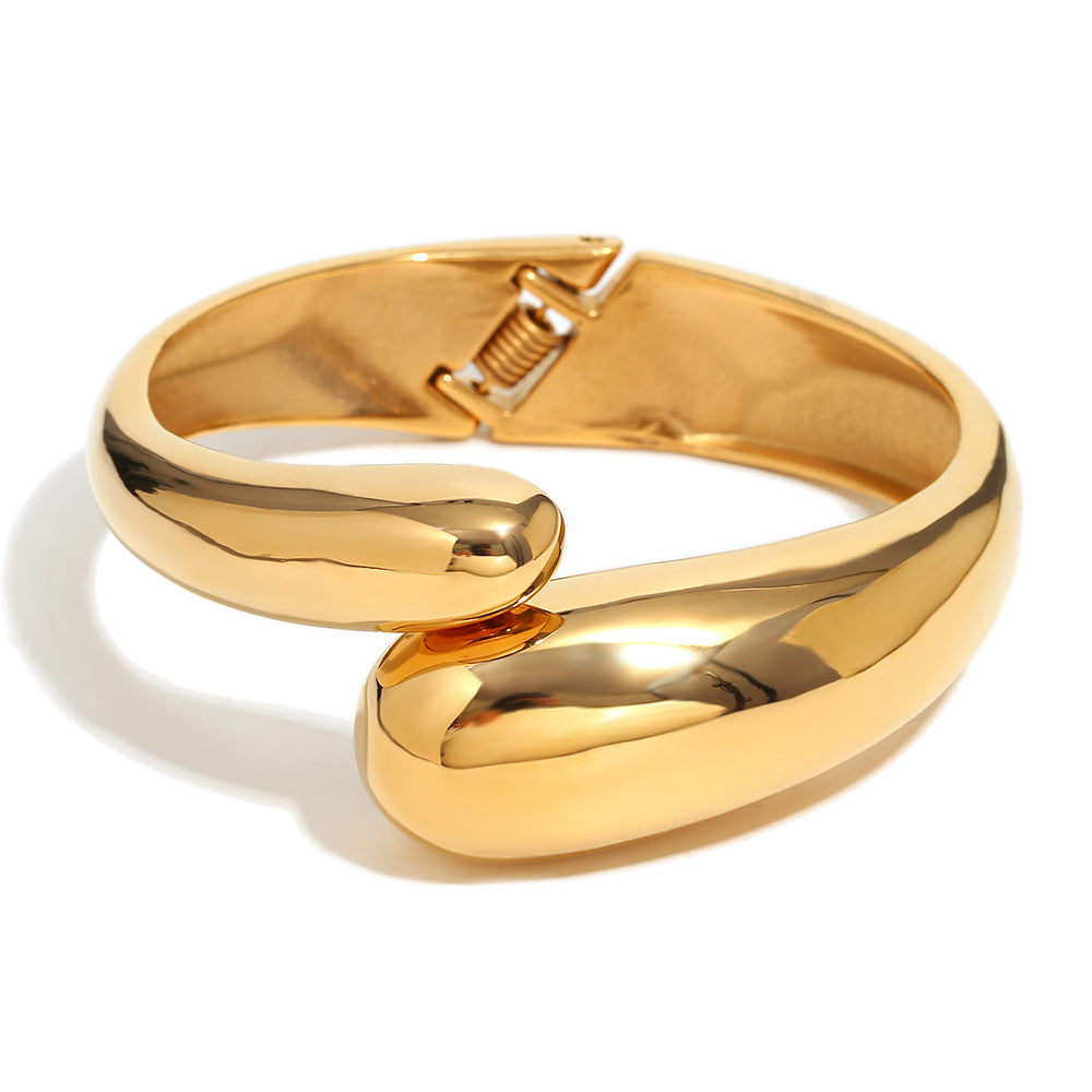 Pulsera minimalista extragrande de acero inoxidable con baño de oro de 18K y diseño de doble cabeza de serpiente para mujer
