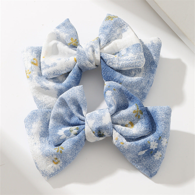 Set de pinzas para el cabello florales pastel dulces para niñas con diseño de tela en forma de moño en estilo ligero de lujo