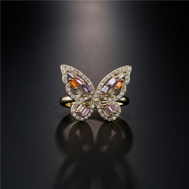 INS Style Geometric Butterfly Ring in Copper with Micro-Paved Cubic Zirconia and 18K Gold Plating