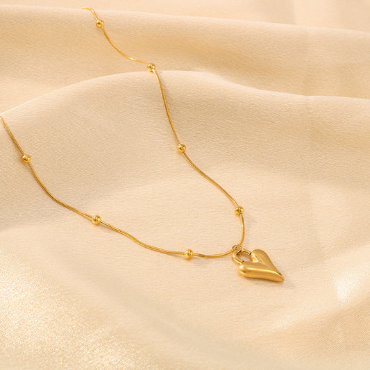 Collar Minimalista de Acero de Titanio en Forma de Corazón con Chapado en Oro de 18K en Cadena Tipo O para Mujer