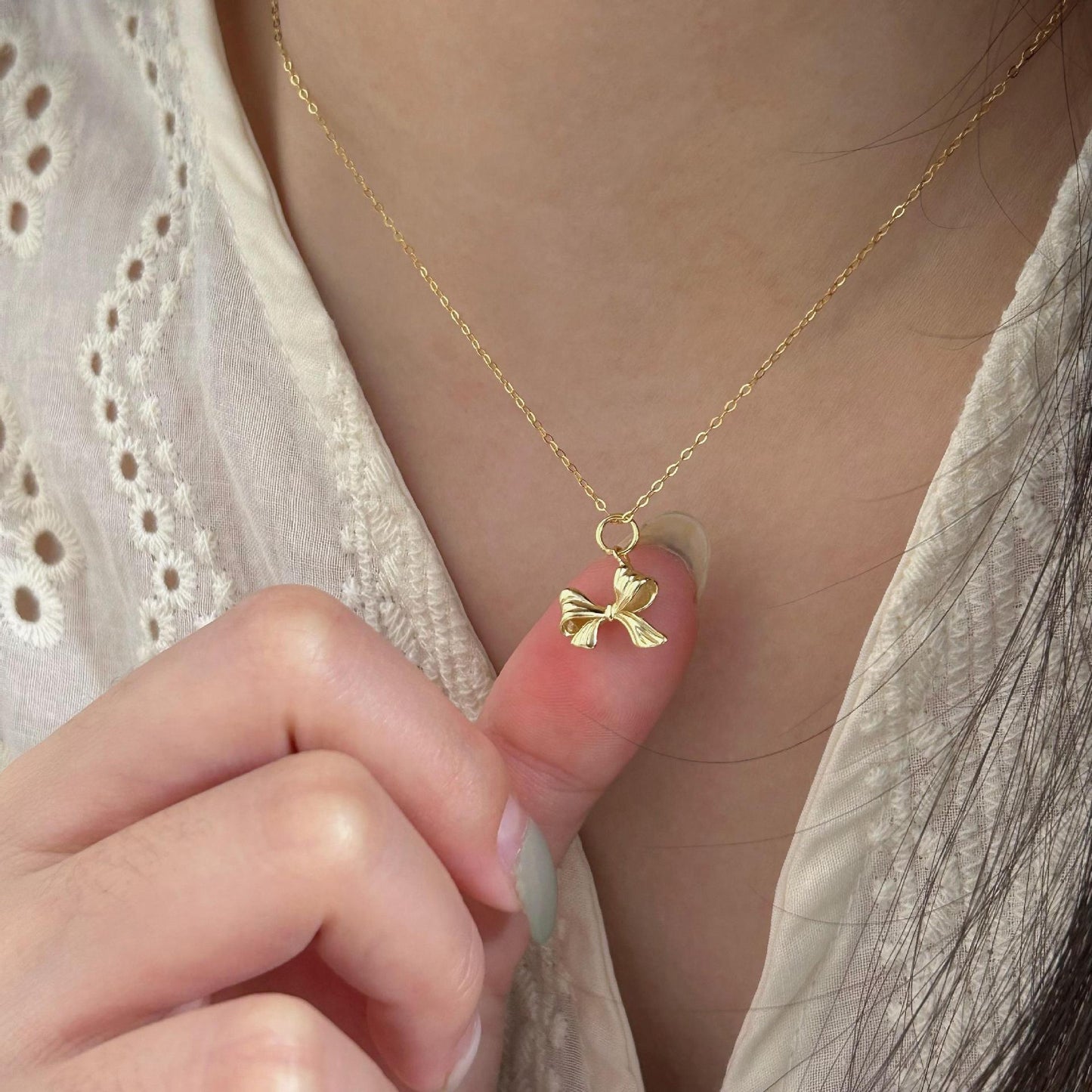 Minimalist Bow Knot Pendant Necklace in 925 Sterling Silver with Plated Finish on Cross Chain